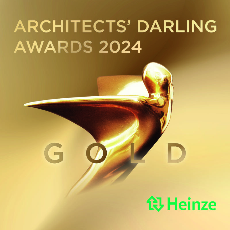 Goldenes Trophäendesign mit dem Text „Architects‘ Darling Awards 2024 Gold“ und dem Logo von Heinze, das herausragende Leistungen im Bereich Architektensoftware würdigt.